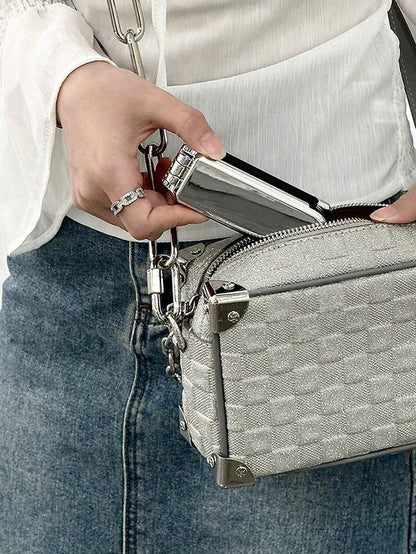 A Shiny Electroplated Silver Comb With A Foldable Design, A Small Mirror, Compact And Portable