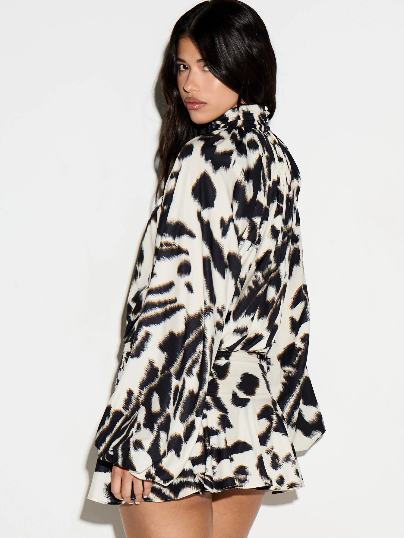 KIZN Animal Print High Neck Plunge Front Mini Dress With Long Puff Sleeves And Ruffle Details Belt Waist Fit Flare Party