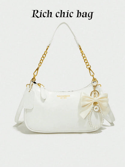 Stylish New Shoulder Bag Featuring Patterned Accents And A Pearl Bow Pendant. Solid-Color Waterproof PU Fabric Shoulder Bag Crescent Bag, Underarm Bag
