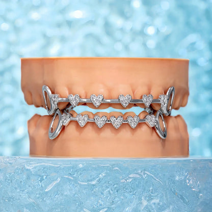 THATBOY 2pcs Love Connection Side Hollowed-Out Grillz Copper Inset 5A Zirconia Hip Hop Jewelry Grillz Cool Pop Party Gift Lady Grillz